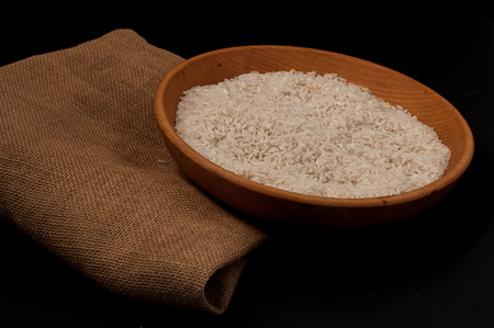 Closeup rice in wooden bowlの写真素材