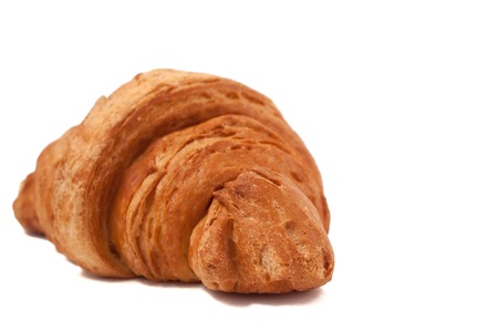 Fresh and tasty croissant isolated white backgroundの写真素材