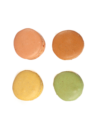Delicious multicolored cake macaron or macaroon on a white background.の写真素材