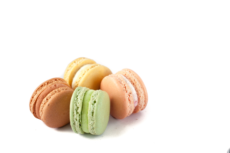 Delicious multicolored cake macaron or macaroon on a white background.の写真素材