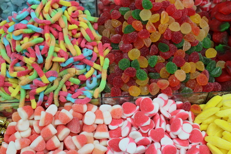 candies and sweets in the market backgroundの写真素材