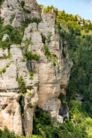 The troglodyte village of Saint-Marcellin is nestled at the foot of the cliffs of the Gorges du Tarnの写真素材
