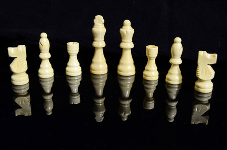 Chess Pieces on Black Background