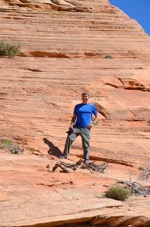 Handsome Middle Aged Man Hiking at Zion National Park in Utahの写真素材