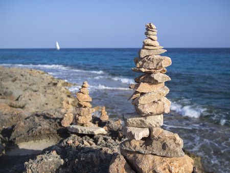 Piles of stones in the seaside in Majorca, Balearic Islands, Spainの写真素材