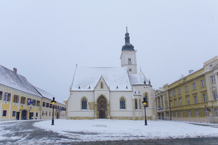 ZAGREB, CROATIA - MARCH 2015: Saint MarkÃÂ´s Church in Zagreb on a snowy winter morningのeditorial素材