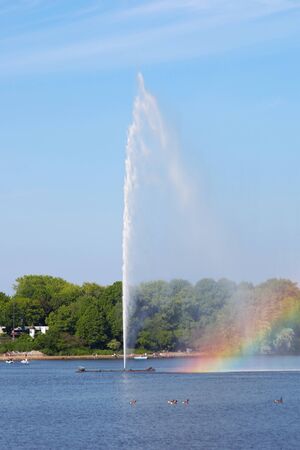 HAMBURG, GERMANY - JUNE 2019 Fountain and Rainbow at Hamburg Inner Alster 0499のeditorial素材