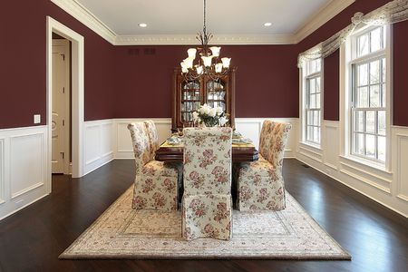 Dining room with red wallsの写真素材