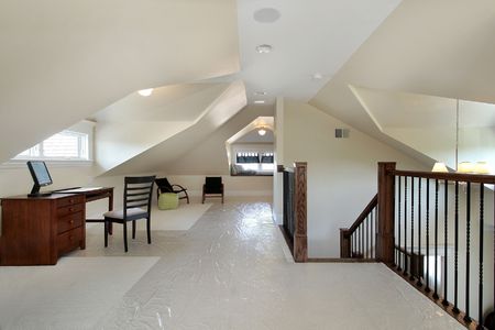 Loft in new construction home with deskの写真素材