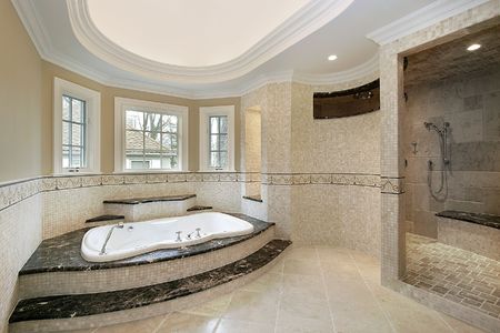 Master bath in new construction home with marble steps