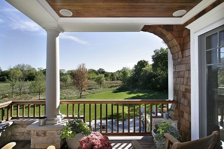 Deck of luxury home with view of prarie and golf courseの写真素材
