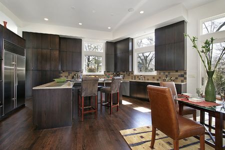 Modern kitchen with island and eating areaの写真素材