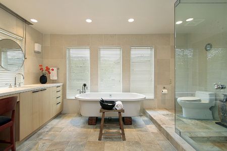 Master bath with glass shower in luxury homeの写真素材