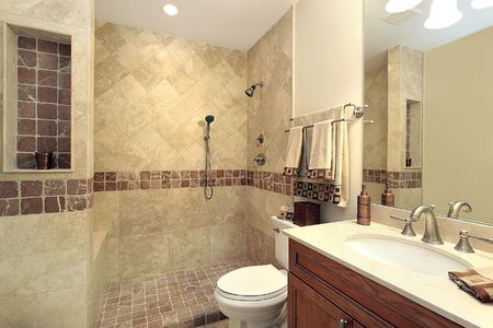 Master bath in luxury home with stone showerの写真素材