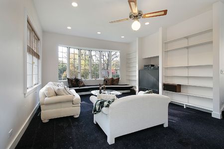 Family room in remodeled home with white sofaの写真素材