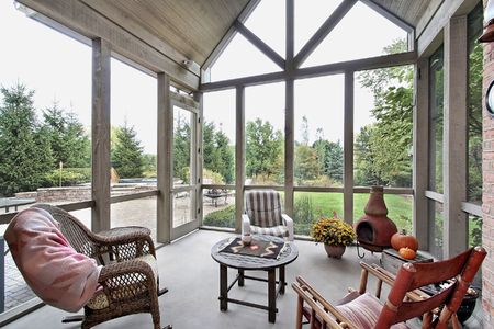 Screen porch in luxury home with patio viewの写真素材