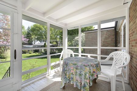 Porch in suburban home with stairs to yardの写真素材
