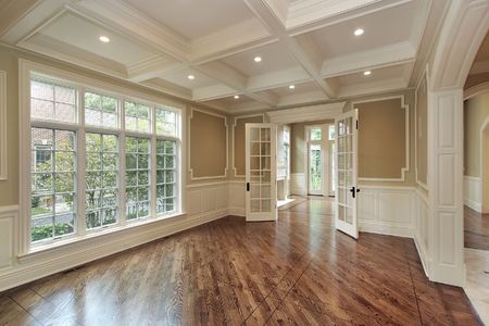 Dining room in new construction home with windowed doorsの写真素材