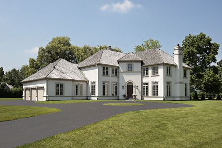 Luxury home in suburbs with three car garageの写真素材