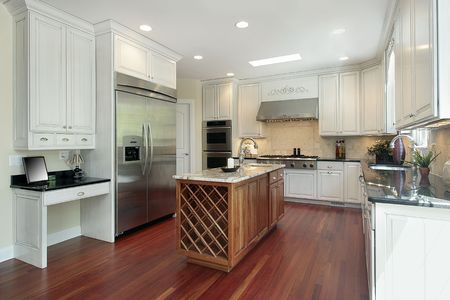 Kitchen with wood island in new construction homeの写真素材