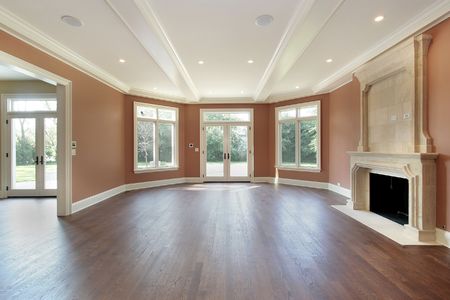 Living room in luxury home with orange wallsの写真素材