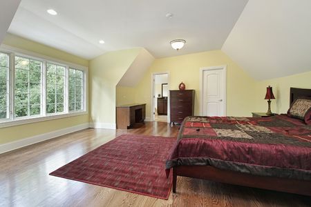 Master bedroom in luxury home with tray ceilingの写真素材