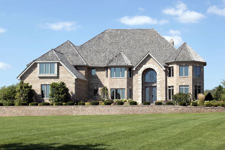 Luxury brick home with cedar shake roofの写真素材