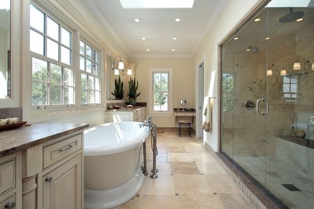 Master bathroom in new construction home with large tubの写真素材