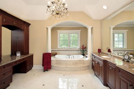 Master bath in new construction home with tub columnsの写真素材