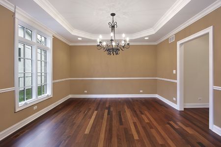 Dining room in new construction home with tan wallsの写真素材