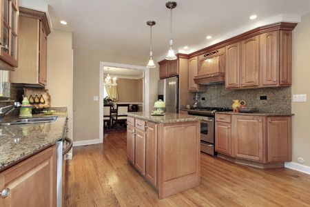 Kitchen in suburban home with center islandの写真素材