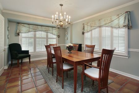 Dining room in suburban home with spanish floor tilesの写真素材