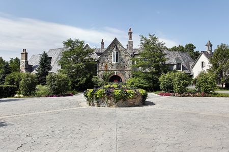 Courtyard of luxury home with stone entrywayの写真素材