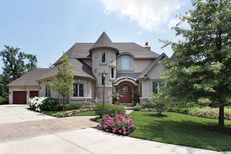 Luxury home in suburbs with front turretの写真素材