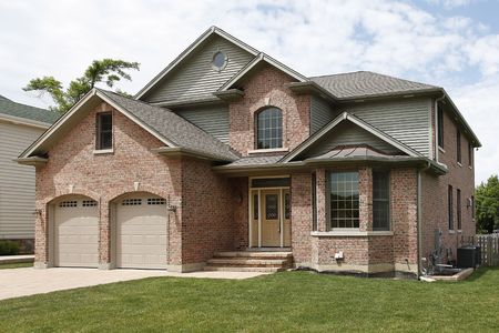 Front view of new construction brick homeの写真素材