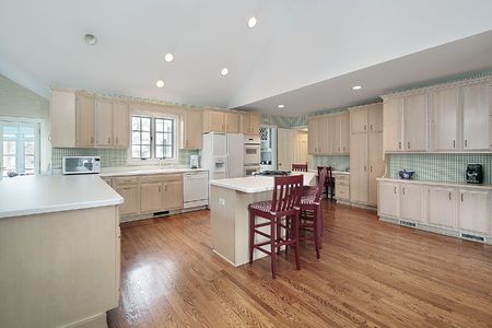 Large kitchen in suburban home with wood cabinetryの写真素材