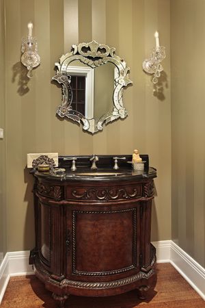 Powder room in luxury home with oval sinkの写真素材