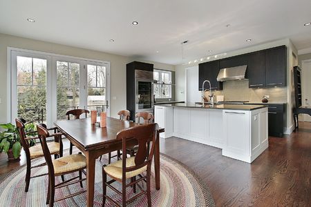 Kitchen in luxury home with eating areaの写真素材