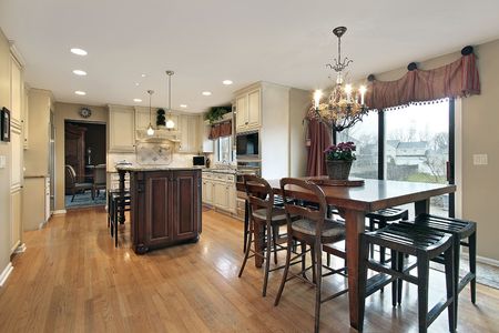 Kitchen in luxury home with eating areaの写真素材