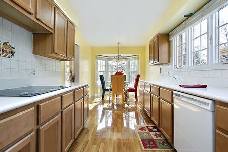 Kitchen in remodeled home with wood cabinetryの写真素材