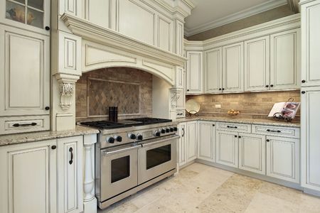 Closeup of luxury kitchen with oak wood cabinetryの写真素材
