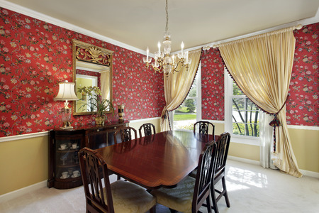 Dining room in suburban home with flowered wallpaper.の写真素材