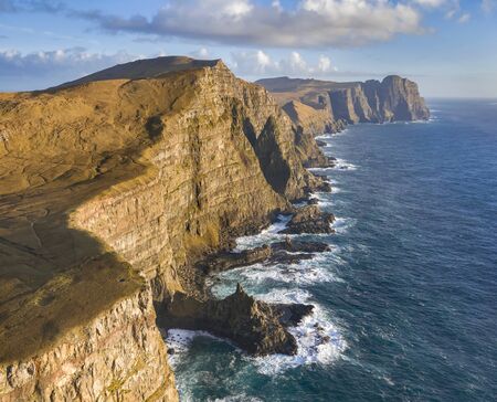 Aerial view of the Eggjarnar Cliffs along the Suduroy coast in the Faroe Islands.の写真素材