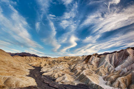 Spectacular cloud formations after sunset at Golden Canyon in Death Valley National Park, Californiaの写真素材
