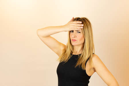Woman disgusted with black t-shirt