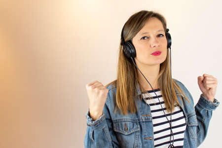 Young woman listening to music