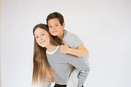 Two good friends hugging smilingの写真素材