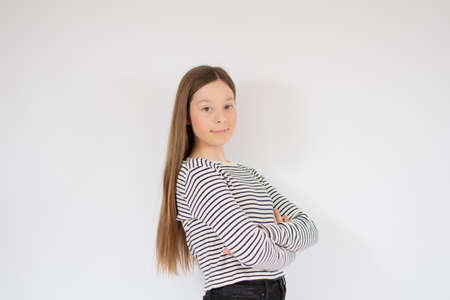 Young girl with striped shirt smiling