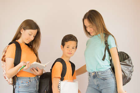 Boy and girls ready for school
