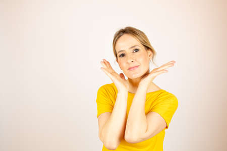 Healthy beautiful woman making a gestureの写真素材